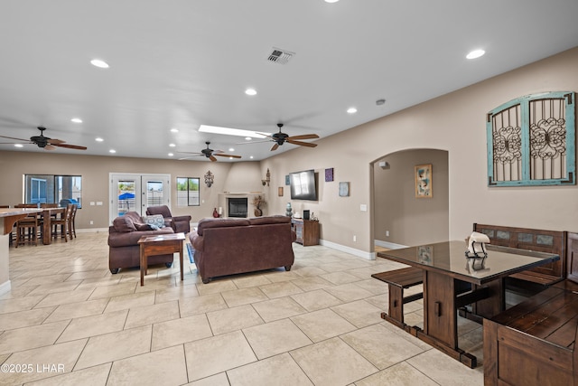 3370 Thunderhead Dr, Lake Havasu City, AZ 86406 - living area with ceiling fan, recessed lighting, arched walkways, and light tile patterned floors