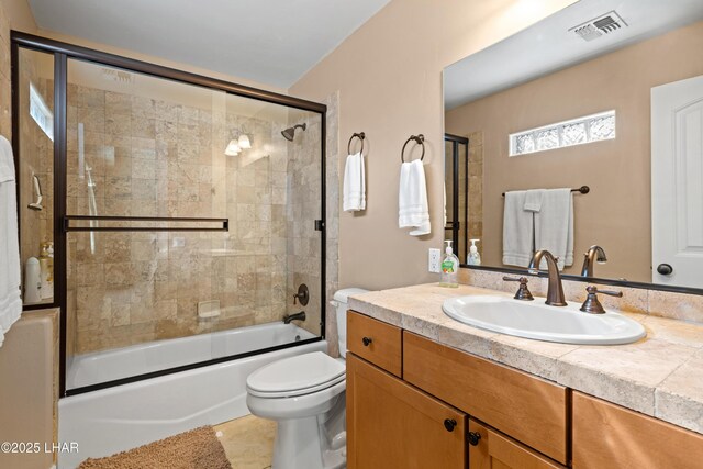3370 Thunderhead Dr, Lake Havasu City, AZ 86406 - bathroom featuring vanity, bath / shower combo with glass door, and tile patterned floors