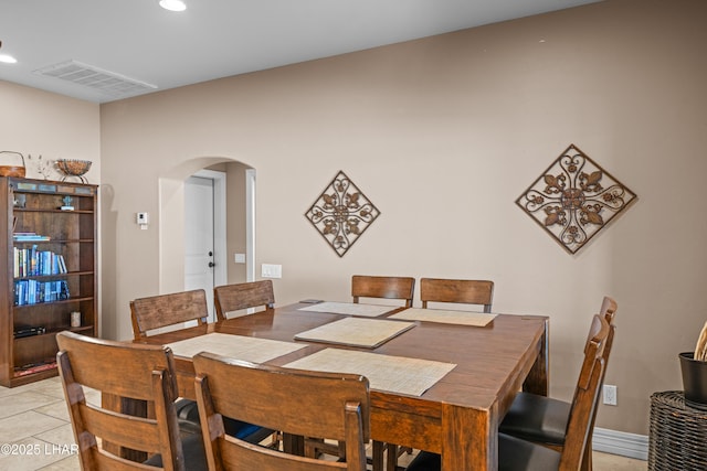 3370 Thunderhead Dr, Lake Havasu City, AZ 86406 - dining area with arched walkways, recessed lighting, and light tile patterned flooring