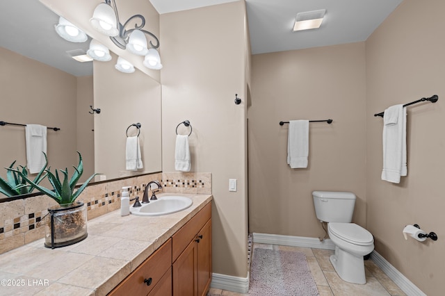 3370 Thunderhead Dr, Lake Havasu City, AZ 86406 - full bathroom featuring vanity, backsplash, and tile patterned floors
