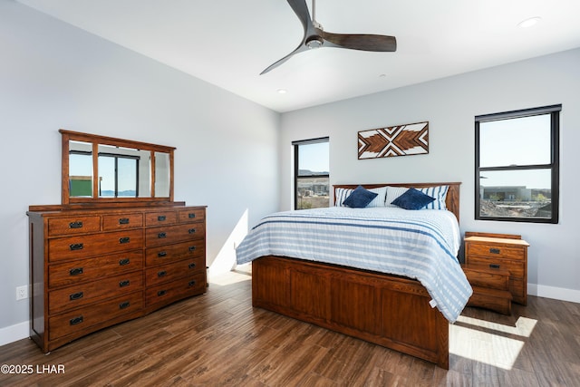 bedroom featuring a ceiling fan, dark wood-type flooring, recessed lighting, and baseboards