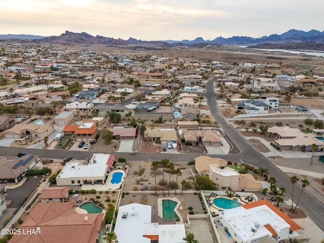 aerial view at dusk with a mountain view