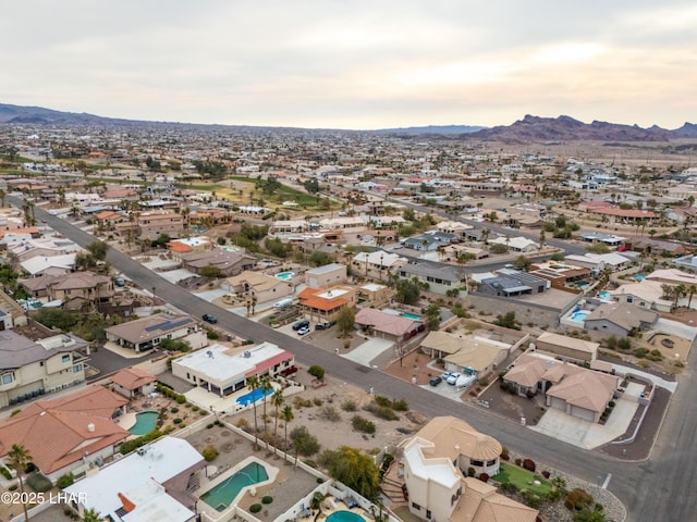 aerial view at dusk with a mountain view