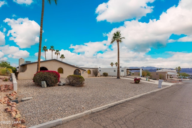 exterior space featuring a mountain view