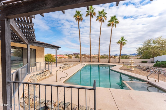 view of pool with a patio and a pergola