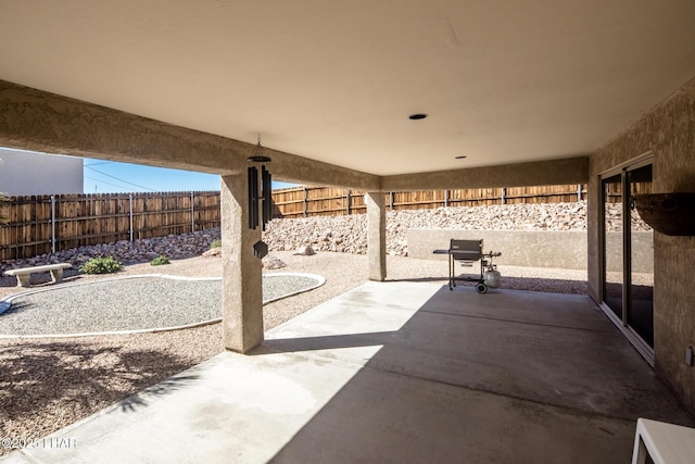 view of patio with a fenced backyard