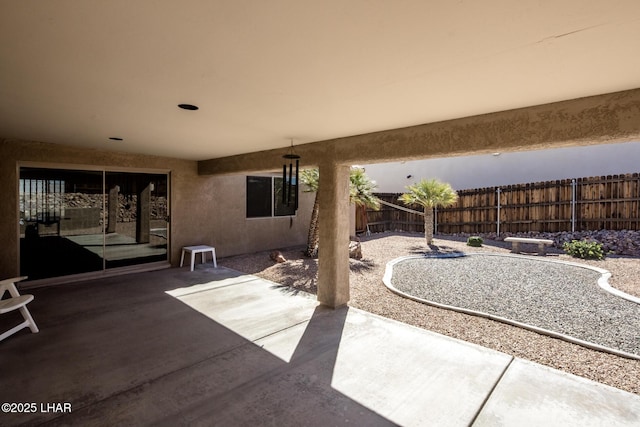 view of patio with fence