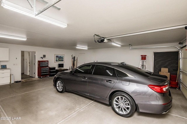 garage featuring a garage door opener