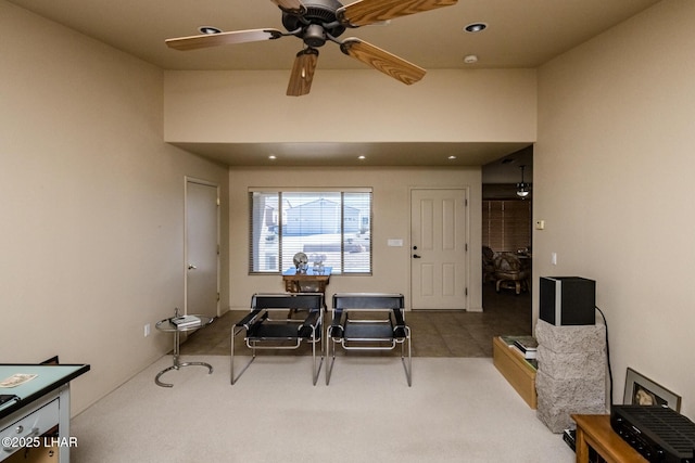 carpeted dining room with ceiling fan and recessed lighting