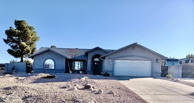 ranch-style home featuring a garage