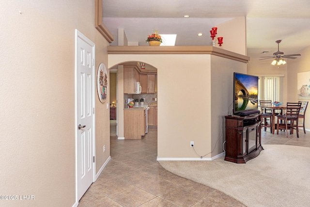 2554 Beverly Glen Dr, Lake Havasu City, AZ 86403 - corridor featuring light tile patterned flooring, arched walkways, baseboards, and recessed lighting