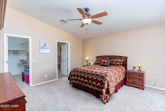 2554 Beverly Glen Dr, Lake Havasu City, AZ 86403 - carpeted bedroom with lofted ceiling, a walk in closet, baseboards, a closet, and ensuite bathroom