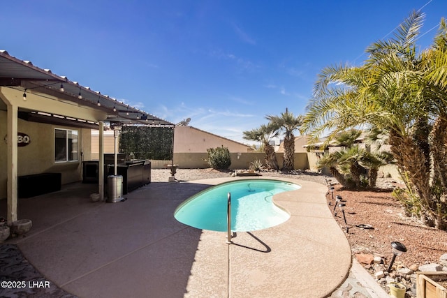 view of pool with a patio area, a fenced backyard, and a fenced in pool