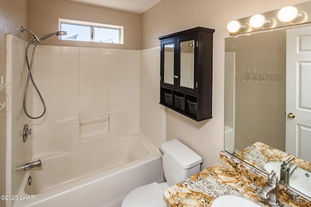 full bath featuring bathtub / shower combination, vanity, and toilet