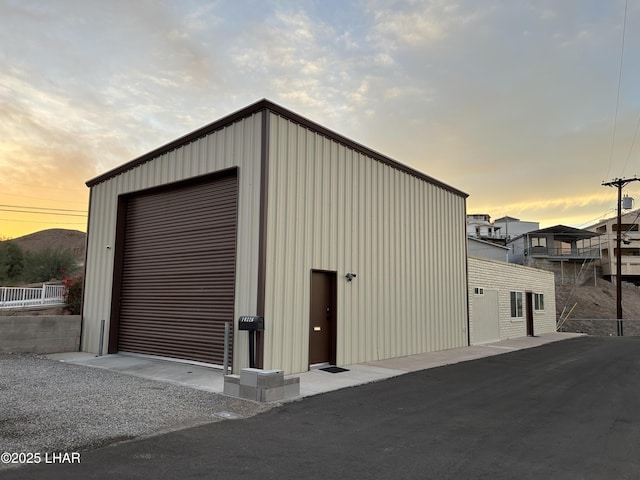 10226 Harbor Dr, Parker, AZ 85344 - outdoor structure at dusk featuring an outbuilding