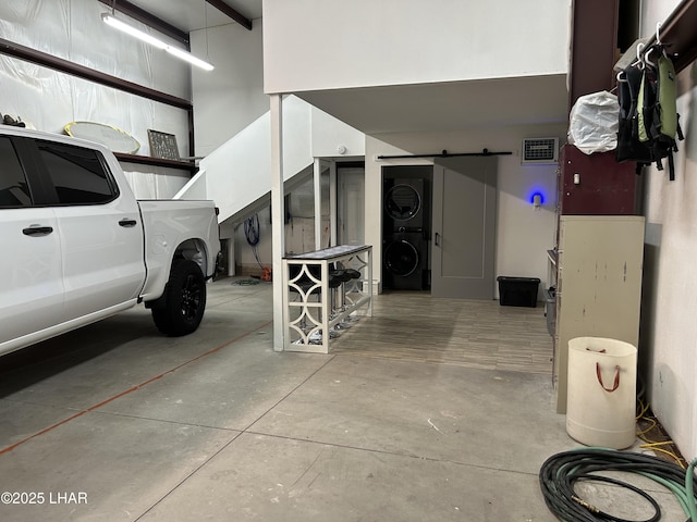10226 Harbor Dr, Parker, AZ 85344 - garage with stacked washing machine and dryer