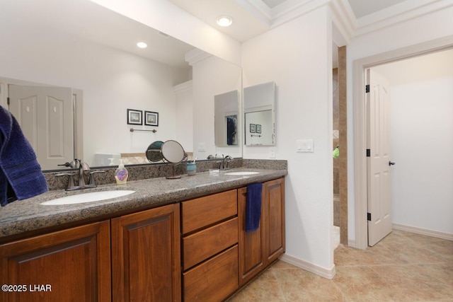 bathroom with vanity and tile patterned flooring