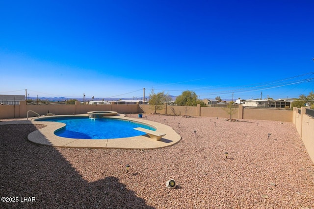 view of pool featuring an in ground hot tub, a patio, and a diving board