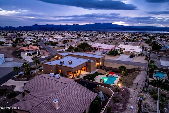 birds eye view of property featuring a residential view and a mountain view