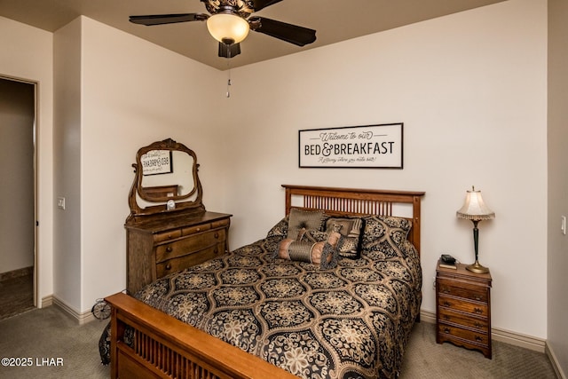 bedroom with ceiling fan, carpet, and baseboards