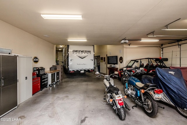 garage featuring a garage door opener