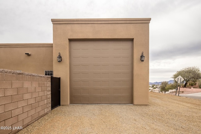 garage featuring driveway