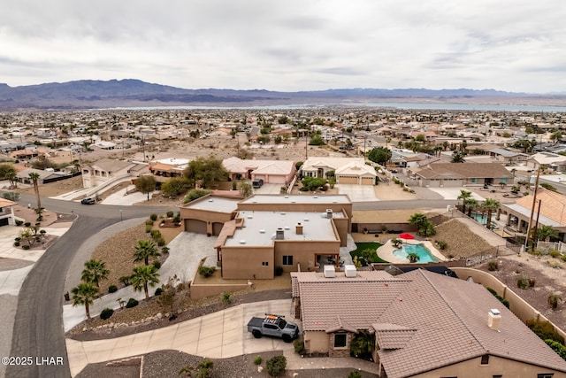 bird's eye view featuring a residential view and a mountain view