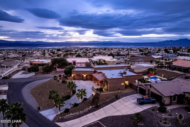 aerial view with a residential view and a mountain view