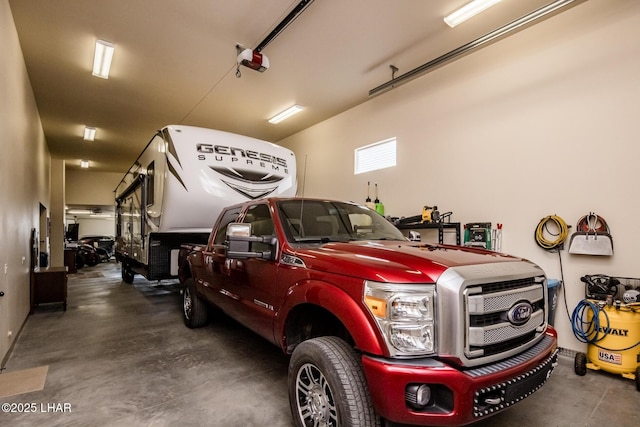 garage featuring a garage door opener