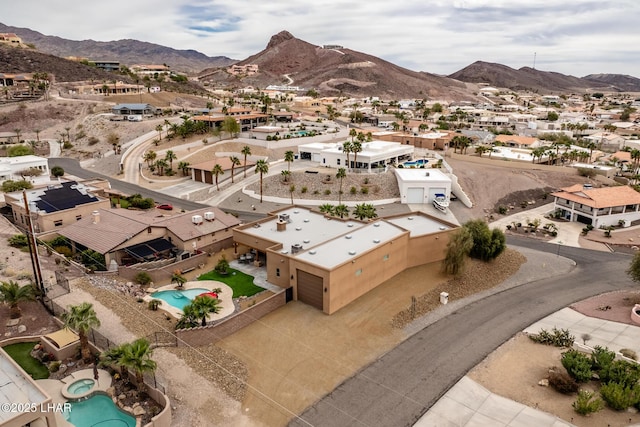 bird's eye view with a residential view and a mountain view