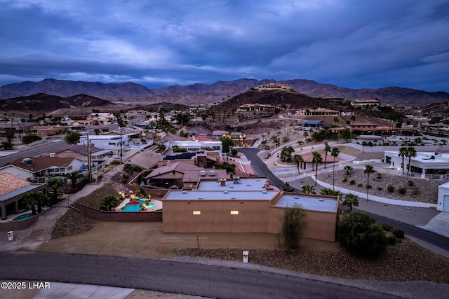 drone / aerial view with a residential view and a mountain view