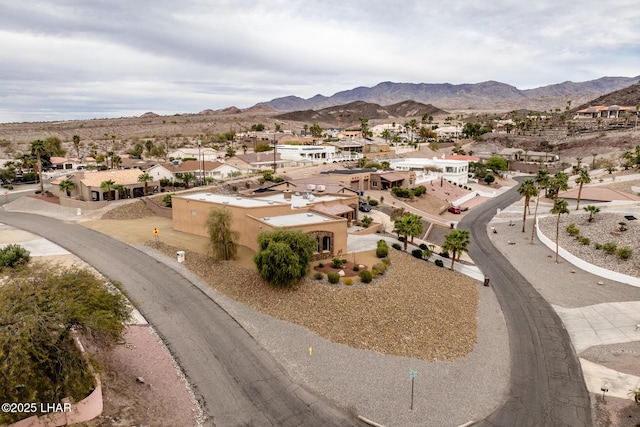 drone / aerial view with a residential view and a mountain view