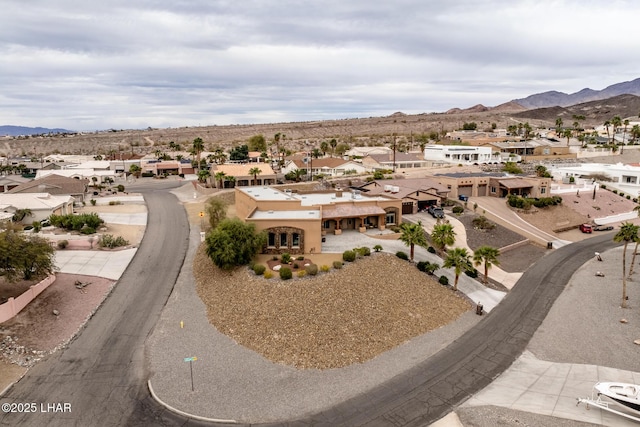 aerial view with a mountain view and a residential view