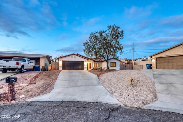 ranch-style house featuring a garage