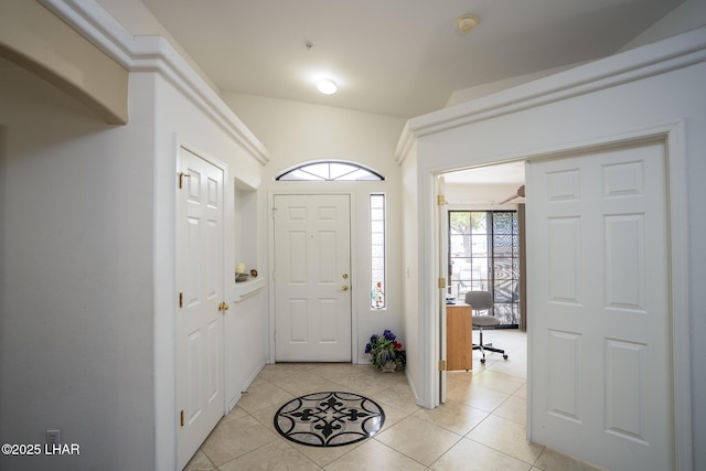 entrance foyer featuring light tile patterned flooring