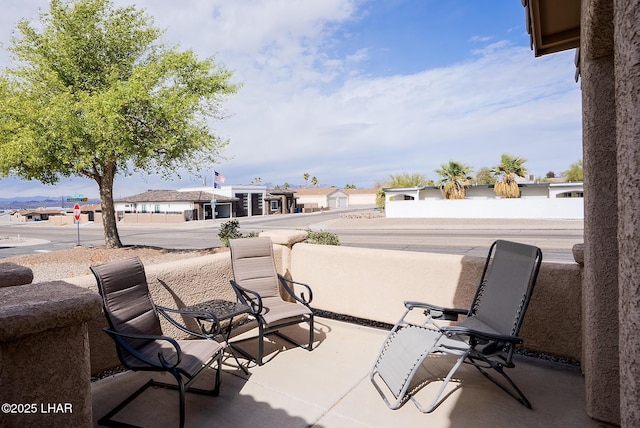 view of patio with a residential view