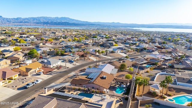 drone / aerial view featuring a mountain view and a residential view