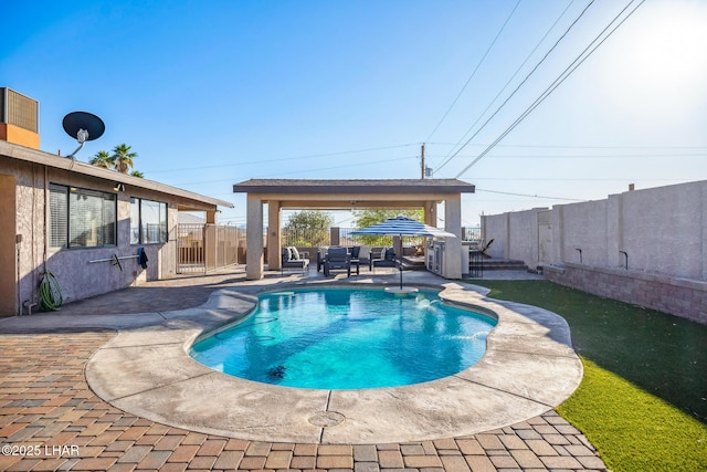 view of pool with a gazebo, a patio area, a fenced in pool, and a fenced backyard