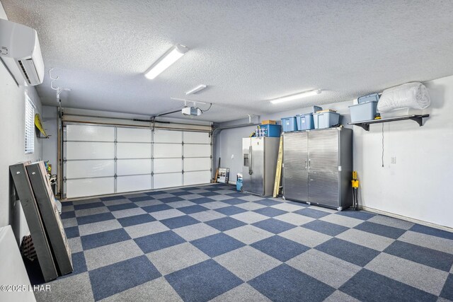 garage with an AC wall unit, a garage door opener, and stainless steel fridge with ice dispenser