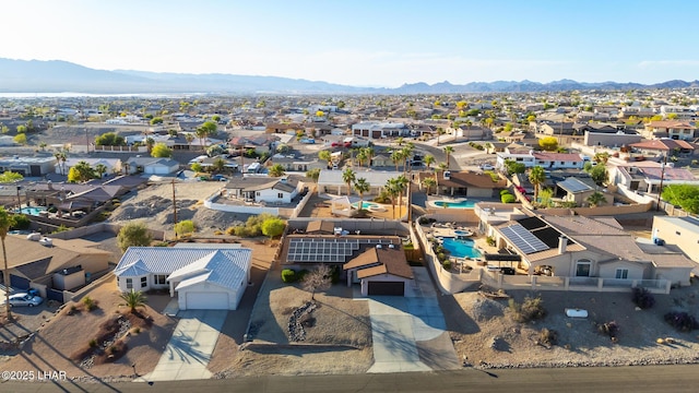 birds eye view of property featuring a residential view and a mountain view