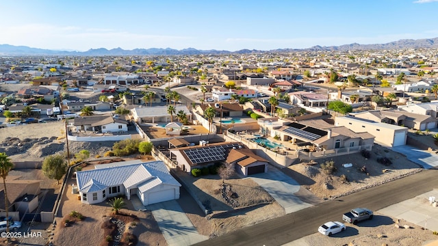 drone / aerial view with a mountain view and a residential view