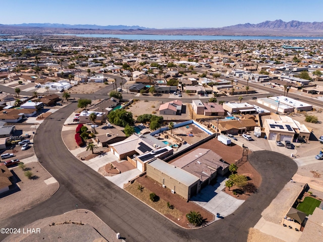 drone / aerial view featuring a mountain view