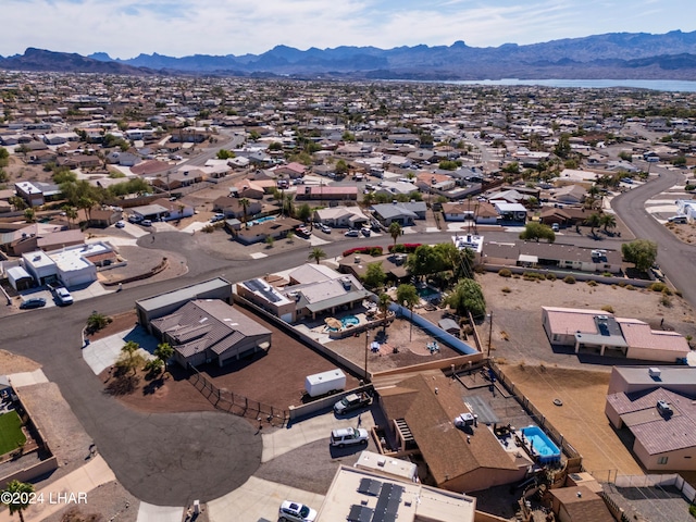 birds eye view of property featuring a mountain view