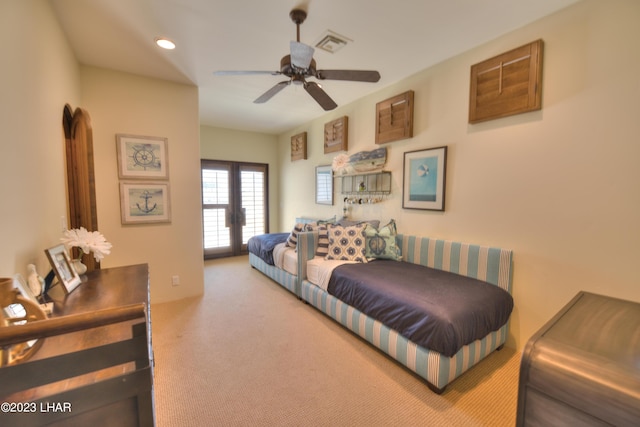 9124 Lakeview Dr, Parker, AZ 85344 - bedroom with french doors, ceiling fan, and carpet flooring