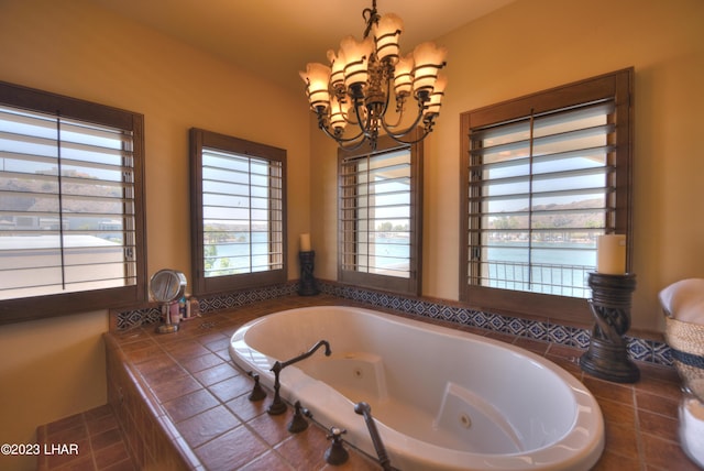 9124 Lakeview Dr, Parker, AZ 85344 - bathroom with tiled bath and a chandelier