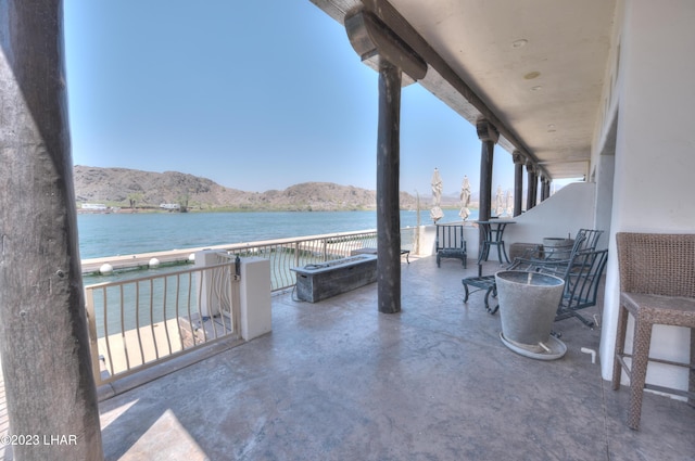 9124 Lakeview Dr, Parker, AZ 85344 - view of patio with a water and mountain view and a balcony