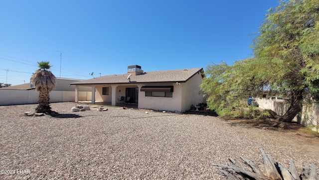 back of house with a patio area