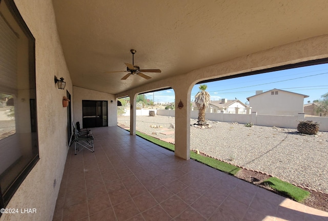 view of patio / terrace featuring ceiling fan