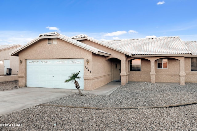 view of front of house with a garage