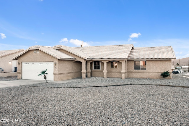 view of front of home featuring a garage